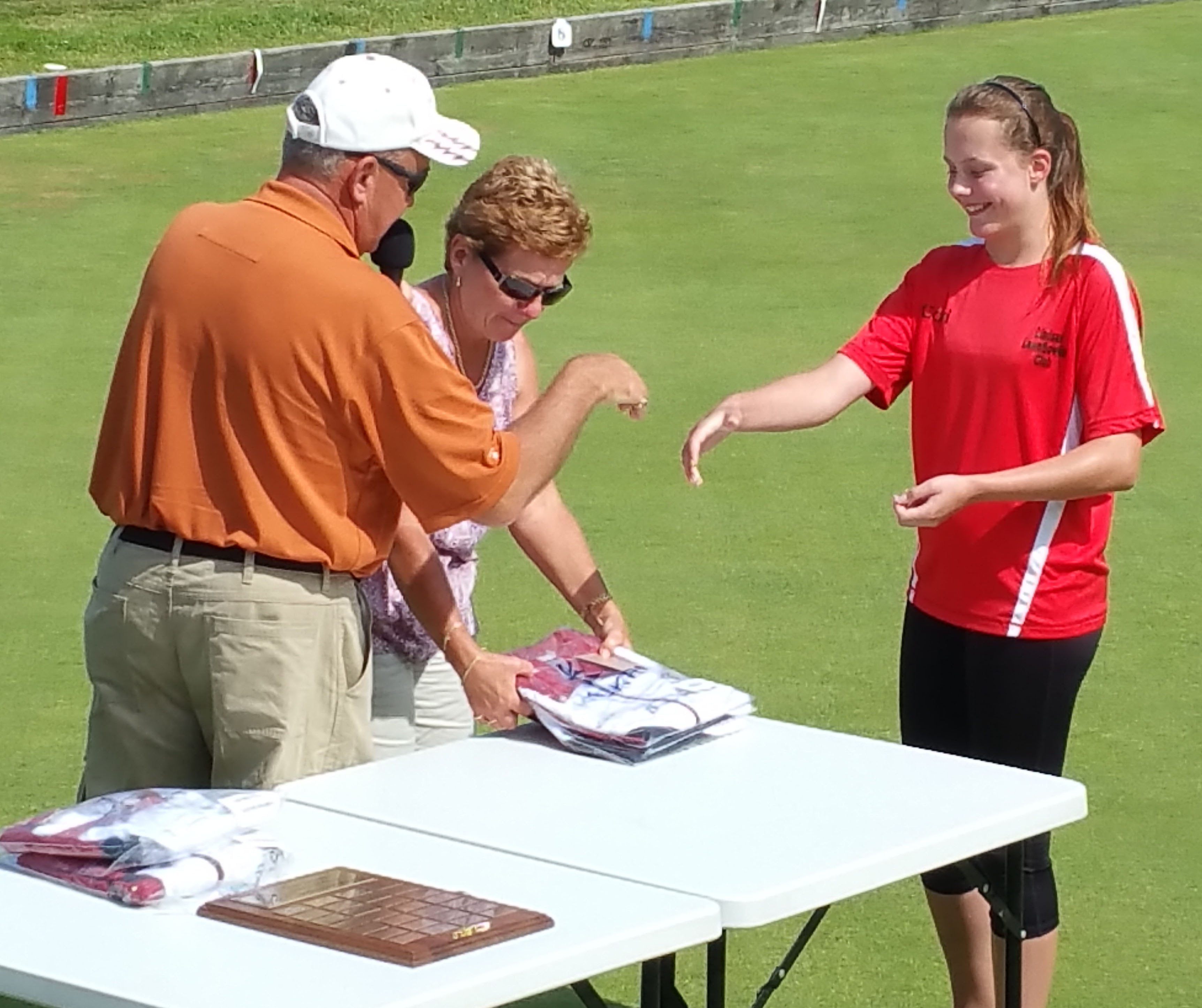 Cori getting her medal